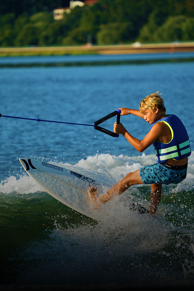 young child on wakeboard in long Island