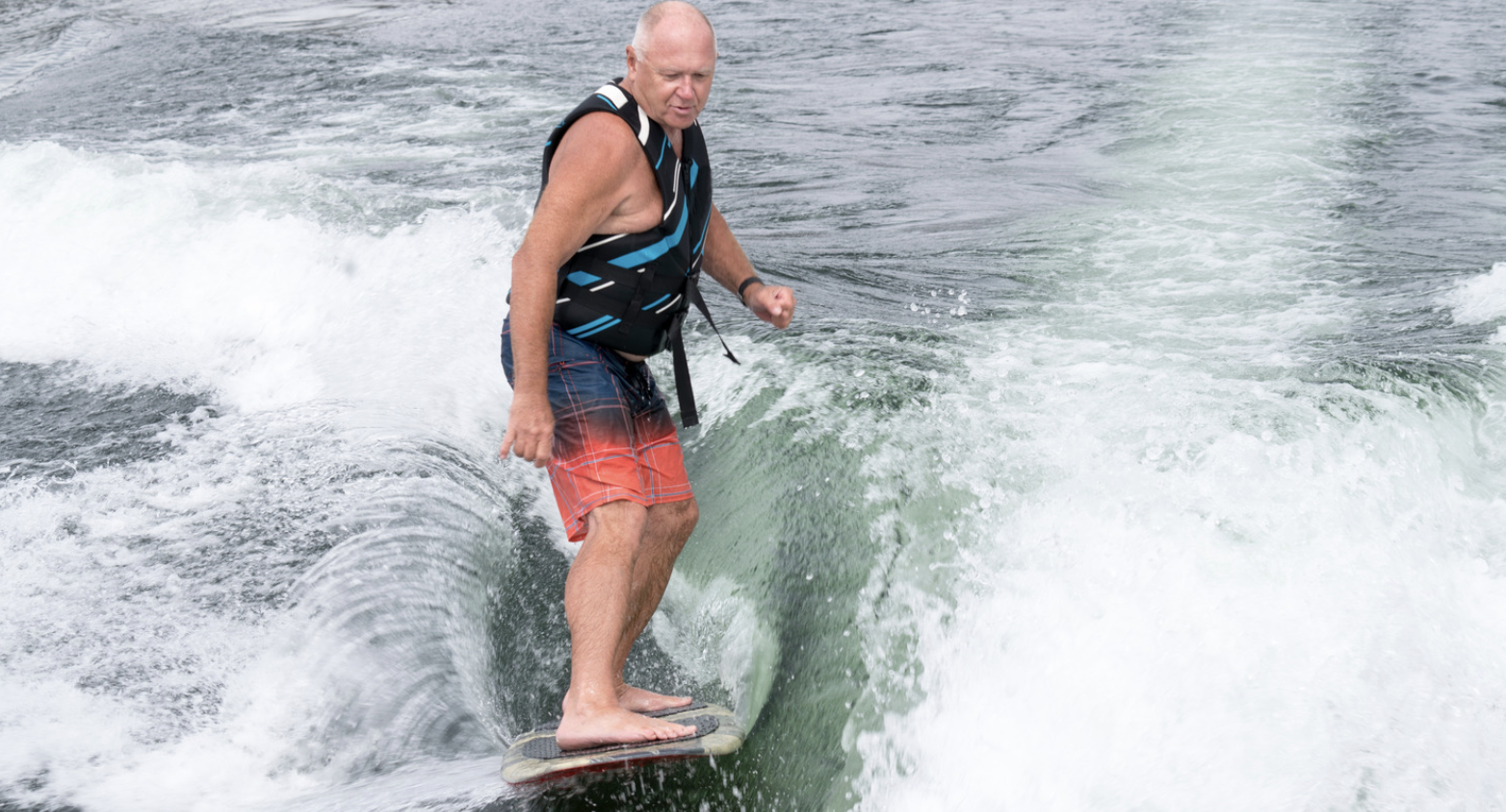 man wakesurfing in long island